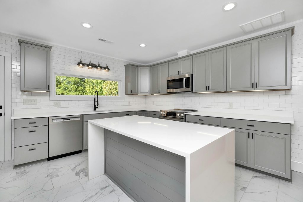 Modern kitchen remodeling service with custom cabinets and interior renovation